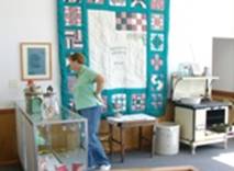 Woman looks at display 