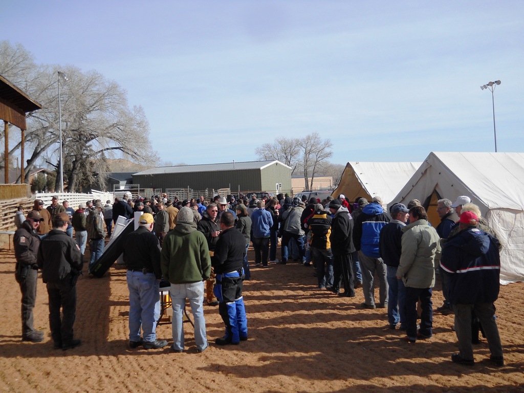 Crowd shot of people waiting in line for free samples of cooked burbot during the closing ceremonies of the 2012 Burbot Bash