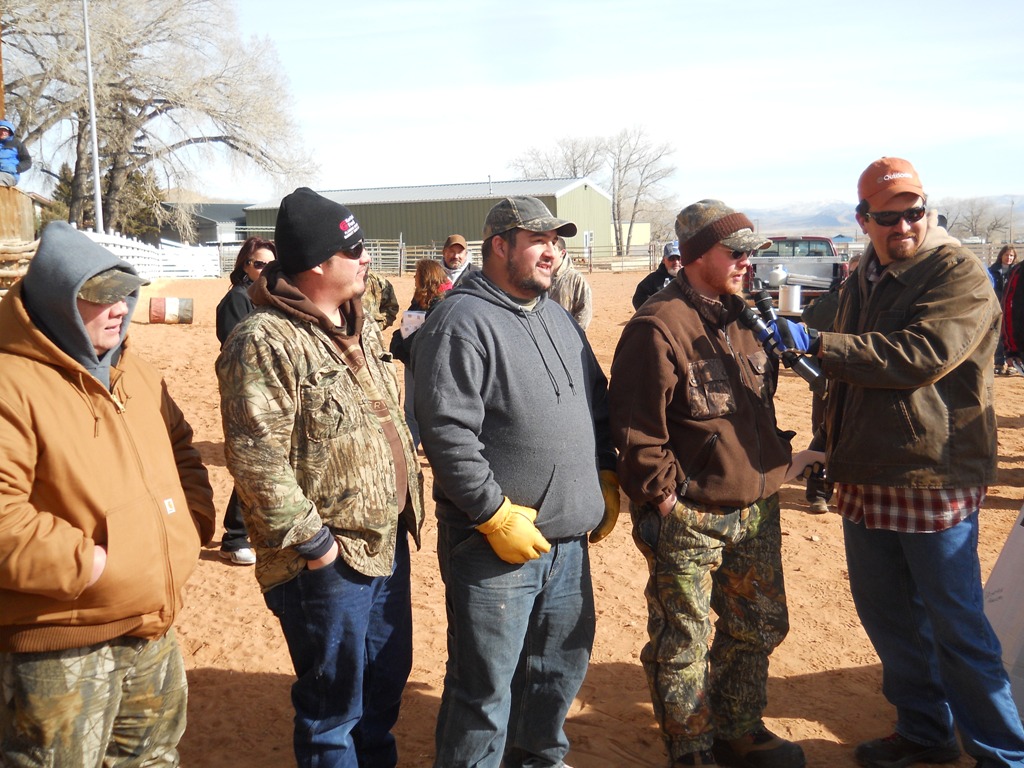 Photo of one of the prize winning teams being interviewed by Adam Eakle at the 2012 Burbot Bash
