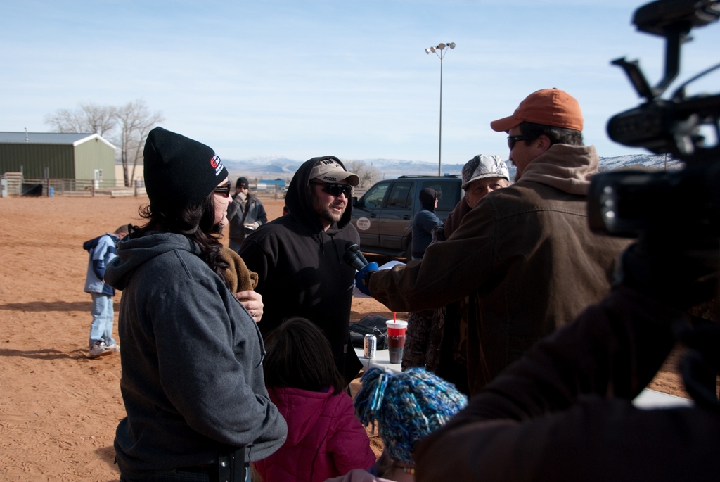 Photo of Adam Eakle interviewing the winner of the tagged fish grand prize drawing during the 2102 Burbot Bash