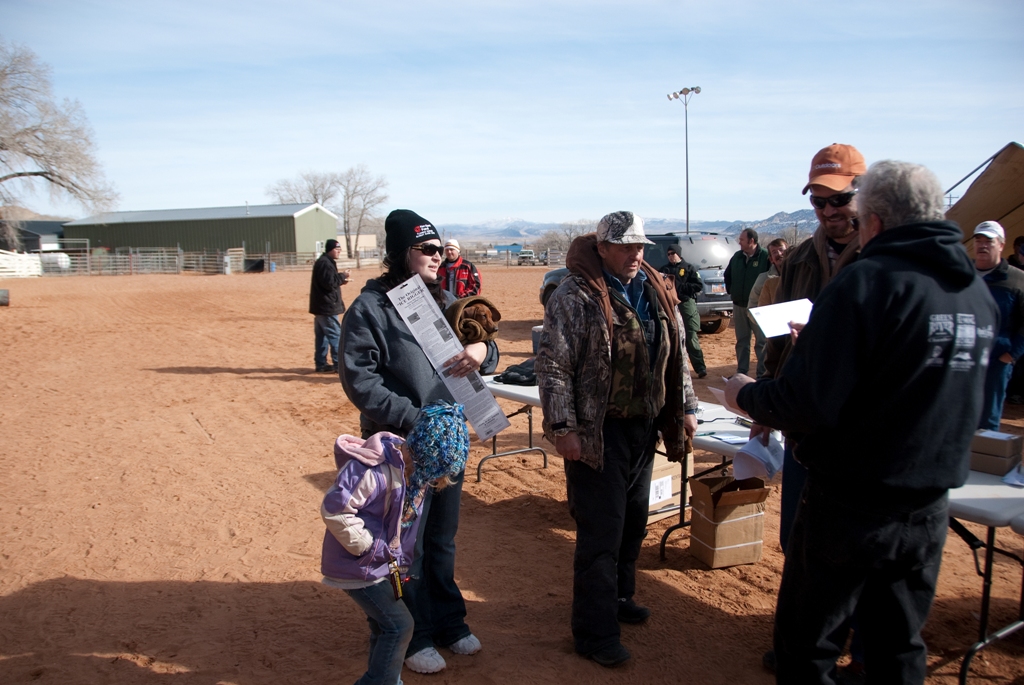 Photo of the awarding of the check for the 2012 tagged fish grand prize drawing during the closing ceremonies of the 2012 Burbot Bash