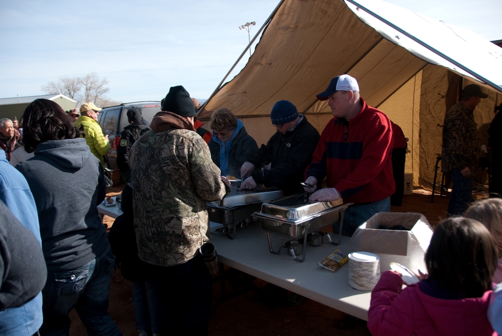 Crowd shot of the burbot sample serving tent during the closing ceremonies of the 2012 Burbot Bash