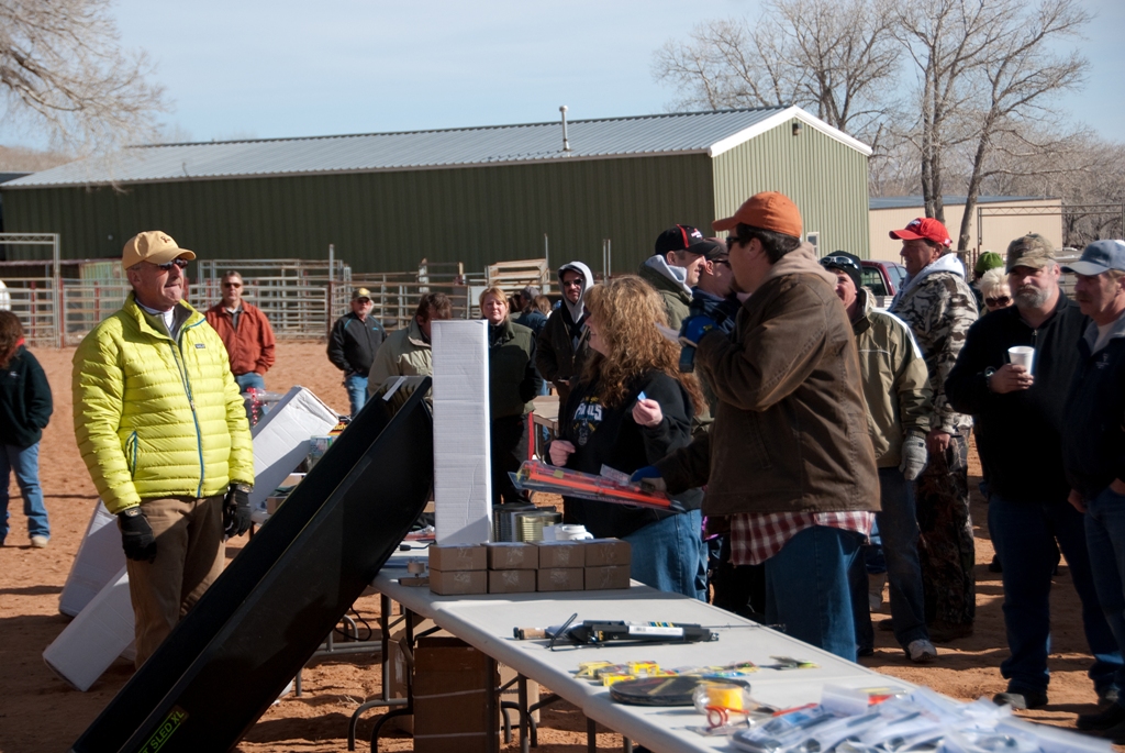 Photo of Adam Eakle calling out the next drawing winner during the closing ceremonies of the 2012 Burbot Bash