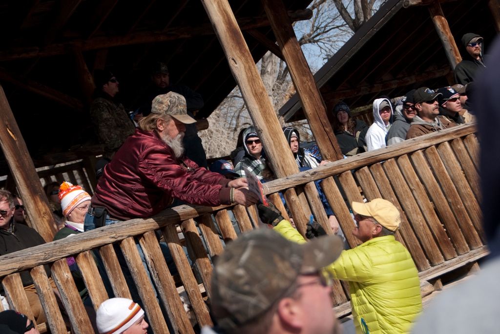 Drawing prize winner receives his prize during the closing ceremonies of the 2012 Burbot Bash