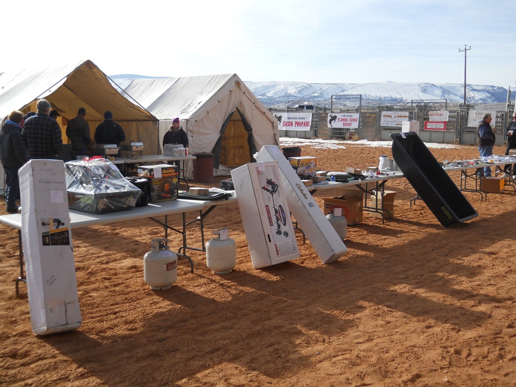 Photo of prize tables stacked with prizes to give away during the closing ceremonies of the 2012 Burbot Bash