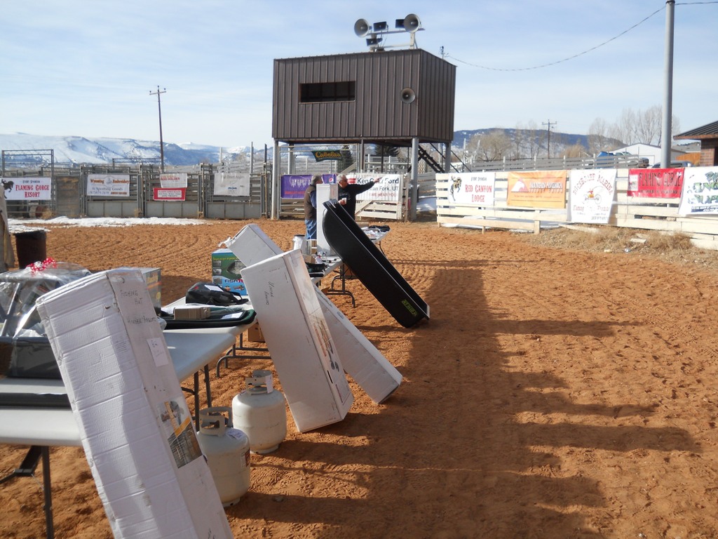 Photo of prize tables stacked with prizes to give away during the closing ceremonies of the 2012 Burbot Bash