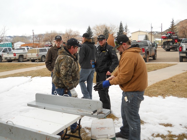 Photo of Burbot tails being cut off at Check-in during 2013 Burbot Bash