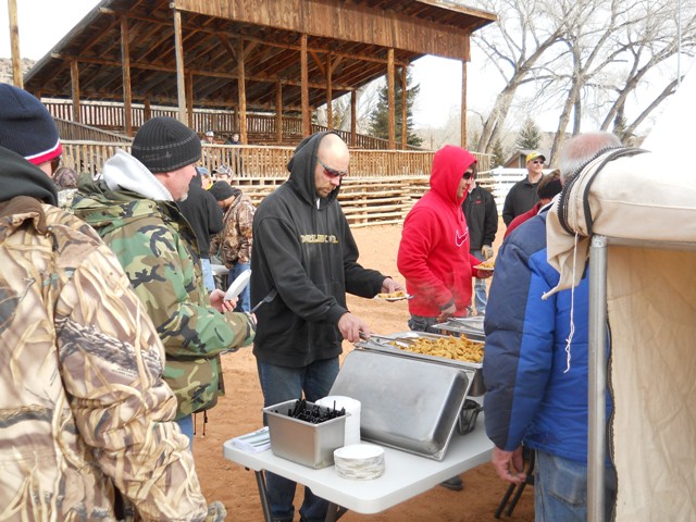 Participants and family members enjoy samples of burbot prepared by the Flaming Gorge Resort during the 2013 Burbot Bash