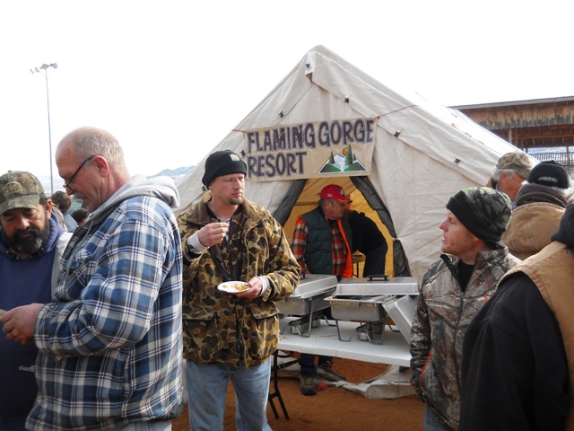 Photo of people eating Burbot prepared during 2013 Burbot Bash Closing Ceremonies