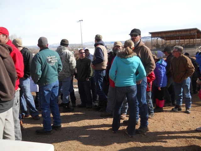 Photo of partial line of winners of various cash prizes during the 2013 Burbot Bash