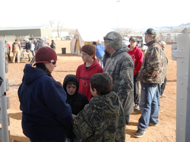Photo of partial line of winners of various cash prizes during the 2013 Burbot Bash