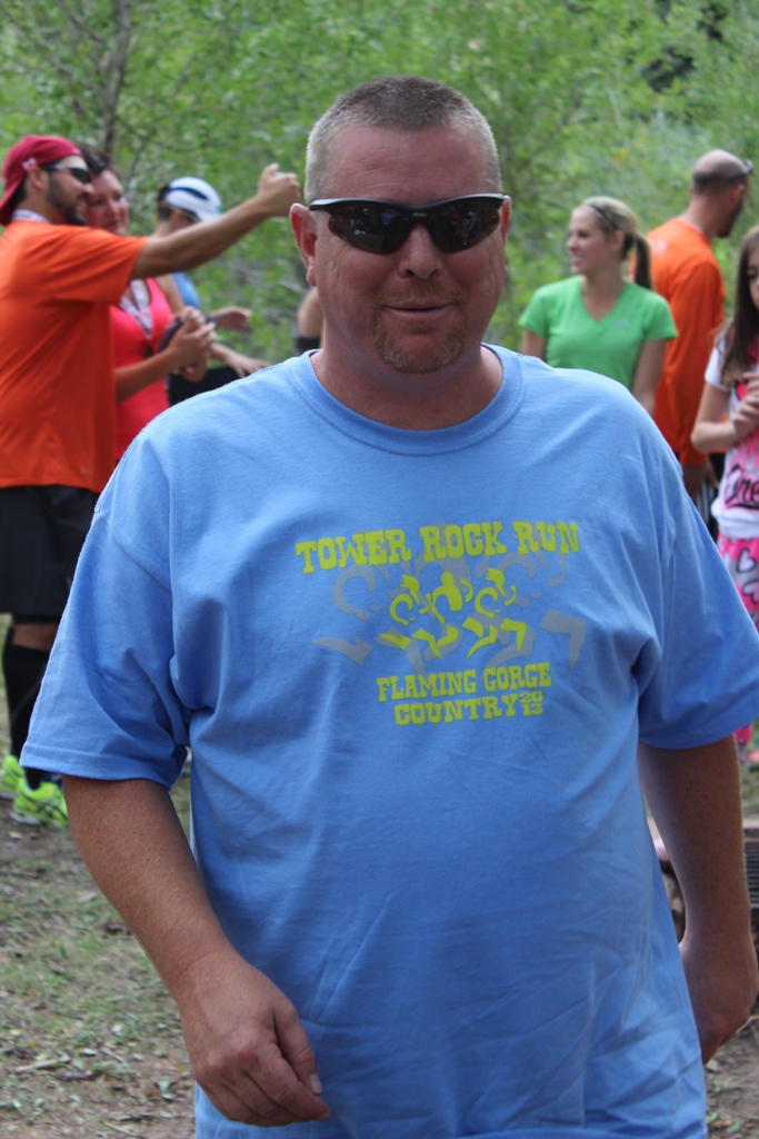 Photo of an ge group winner receiving his award for the Tower Rock Run 5k