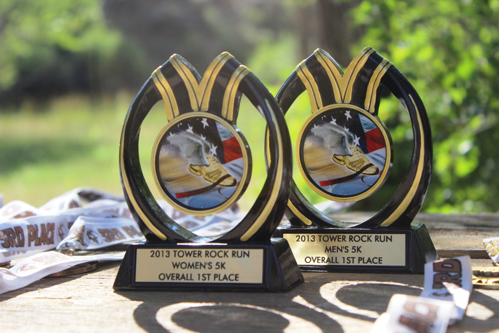Photo of the 5k trophies for top Male and Female runners for the 2013 Tower Rock Run