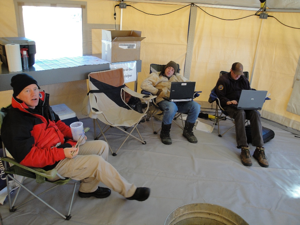 DWR staff and volunteers relax in between fisherman check ins.